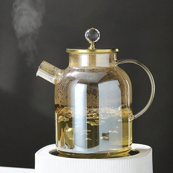 Théière en verre borosilicate avec bec filtrant amovible .