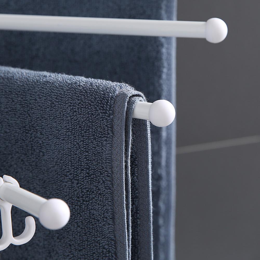 Porte-serviettes auto-adhésif avec crochets rotatifs