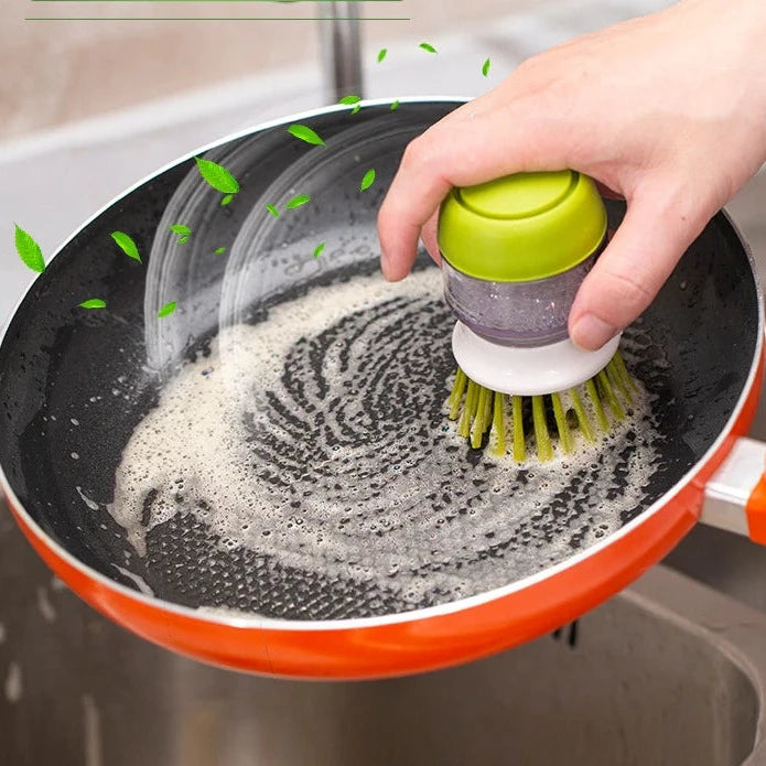Brosse vaisselle avec réservoir à savon