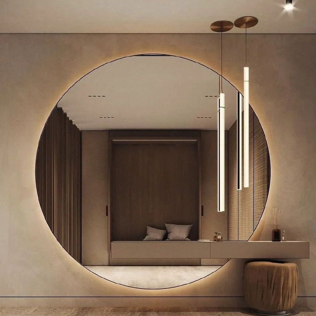 Modern round LED mirror adds beauty to your space.