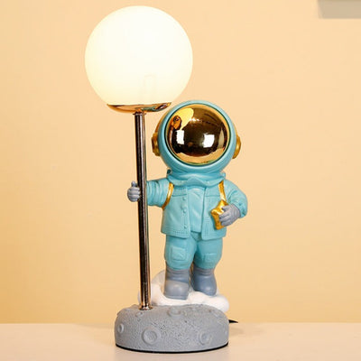 Statue d'astronaute créative avec lampe en lune