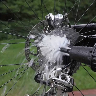 Brosse rotative à jet d'eau pour roues de voiture